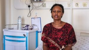 No, you are not getting the password…brave Bobi Wine’s wife resists brutal Museveni’s soldiers